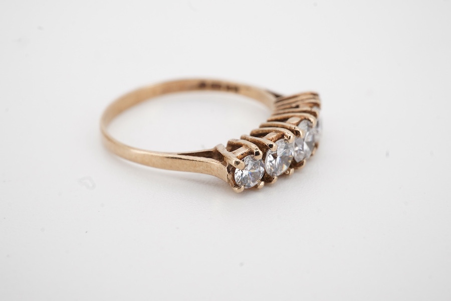 A 1960's Garrard & Co 9ct gold and two colour enamel sweethearts brooch, 36mm, with Asprey box, together with a 9ct gold and five stone simulated diamond set half hoop ring.